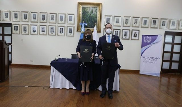 Firman de convenio de cooperación entre el OJ y Cancillería