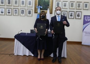 Firman de convenio de cooperación entre el OJ y Cancillería