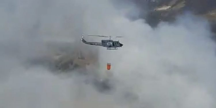 Apoyan vía aérea para apagar incendio en vertedero de la ruta al Pacífico