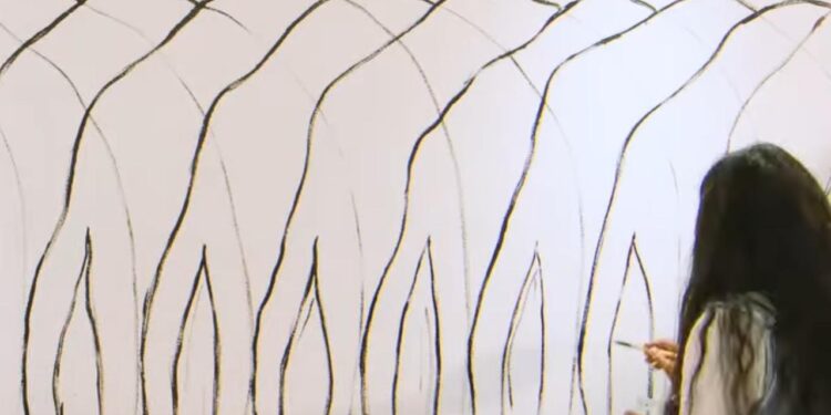 El mural tiene 25 frijoles que representan los 25 idiomas mayas. /Foto: Inguat