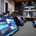 Participantes reunidos en una sala del Ministerio de Gobernación, con pantallas que anuncian el nuevo sitio web de la UPCV.